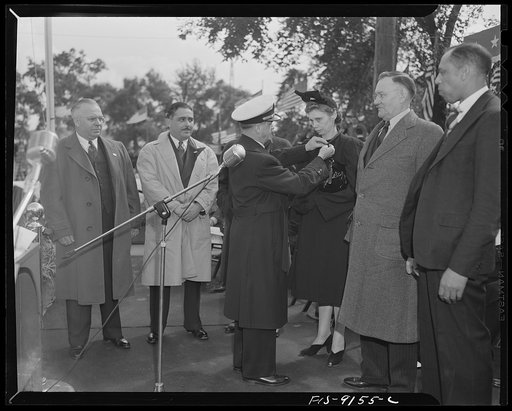 Detroit (vicinity), Michigan. Ceremonies at the presentation of the Army and Navy E award to the Briggs manufacturing company. Presentation of individual excellence awards to workers