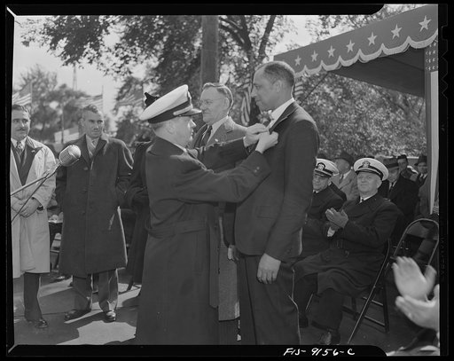 Detroit (vicinity), Michigan. Ceremonies at the presentation of the Army and Navy E award to the Briggs manufacturing company. Presentation of individual excellence awards to workers