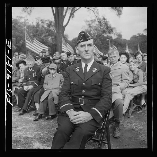 Detroit (vicinity), Michigan. Ceremonies at the presentation of the Army and Navy E award to the Briggs manufacturing company. Worker who is a war veteran