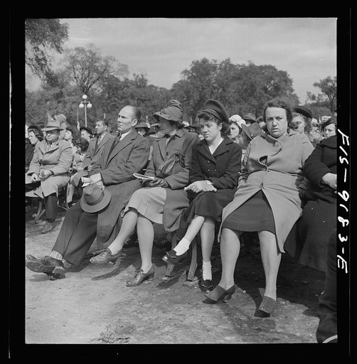 Detroit (vicinity), Michigan. Ceremonies at the presentation of the Army and Navy E award to the Briggs manufacturing company. Woman worker at the ceremony