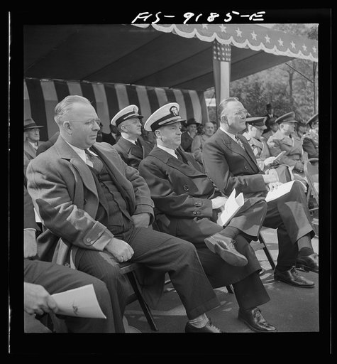 Detroit (vicinity), Michigan. Ceremonies at the presentation of the Army and Navy E award to the Briggs manufacturing company. Speakers on the platform