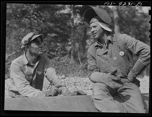 Untitled photo, possibly related to: Arkansas-Texas state line to Gurdon, Arkansas. War emergency pipeline from Longview, Texas to Norris City, Illinois. Electric welder and helper