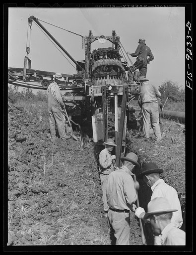 Untitled photo, possibly related to: Arkansas-Texas state line to Gurdon, Arkansas War emergency pipeline from Longview, Texas to Norris City, Illinois. A trench-digging machine