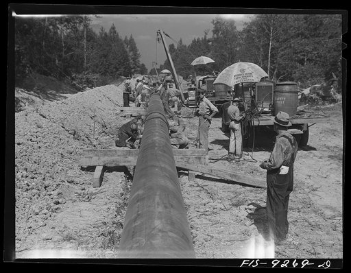 Little Rock, Arkansas to Missouri-Arkansas state line. War emergency pipeline from Longview, Texas to Norris City, Illinois. Each forty-foot section is welded onto the main line in the stove pipe method of welding line