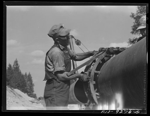 Untitled photo, possibly related to: Little Rock, Arkansas to Missouri-Arkansas state line. War emergency pipeline from Longview, Texas to Norris City, Illinois. Electric welding