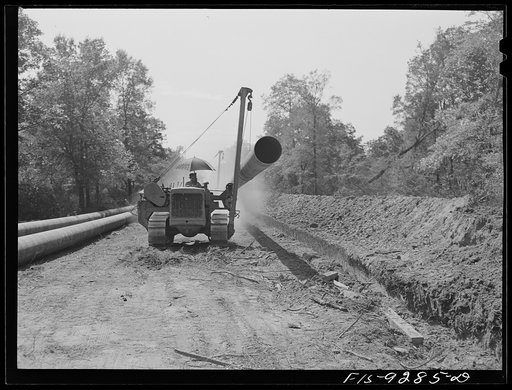 Arkansas-Texas state line to Gurdon, Arkansas. War emergency pipeline from Longview, Texas to Norris City, Illinois. Bringing a forty-foot section to the main line in stove pipe method of welding
