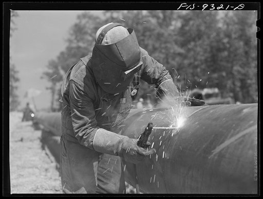 Arkansas-Texas state line to Gurdon, Arkansas. War emergency pipeline from Longview, Texas to Norris City, Illinois. Welder at work