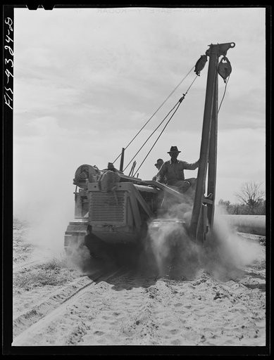 Little Rock, Arkansas to Missouri-Arkansas state line. War emergency pipeline from Longview, Texas to Norris City, Illinois. Caterpillar tractor with crane for lifting pipe