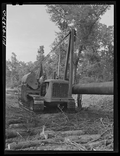Untitled photo, possibly related to: Little Rock, Arkansas to Missouri-Arkansas state line. War emergency pipeline from Longview, Texas to Norris City, Illinois. Cleaning and priming pipe