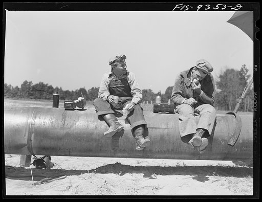 Longview, Texas to Arkansas state line. War emergency pipeline from Longview, Texas to Norris City, Illinois. Pipeliners at lunch