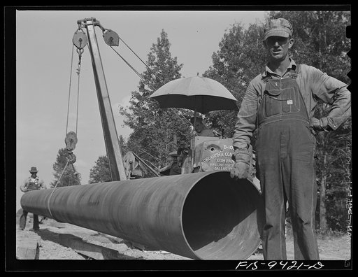 Little Rock, Arkansas to Missouri-Arkansas state line. War emergency pipeline from Longview, Texas to Norris City, Illinois. Section of pipe ready to be joined to the main line by stove pipe method of welding