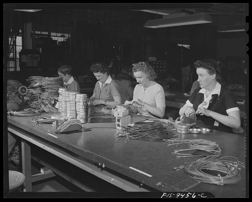 De Soto bomber plant, Detroit, Michigan. Finishing connecting wires