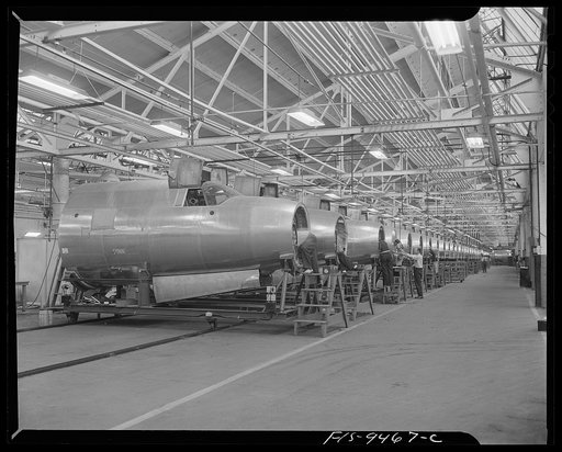 De Soto bomber plant. Detroit, Michigan. Nose section of B-26 bomber showing conveyor line running on the floor