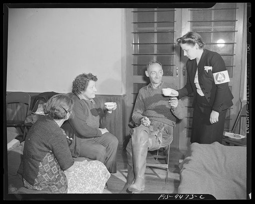 United States Office of Civilian Defense workers serving hot coffee to people driven from their home by flood water. Washington, D.C.