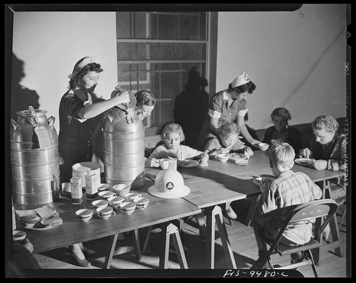 Wash., D.C. United States Office of Civilian Defense workers serving hot coffee to people driven from their homes by flood water