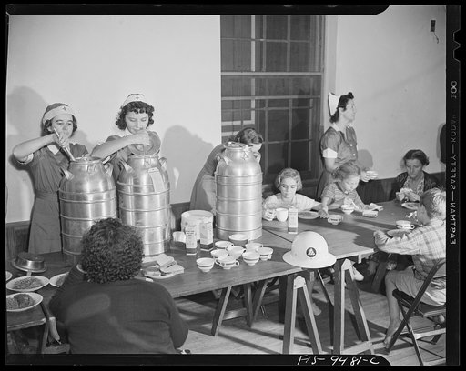 Wash., D.C. United States Office of Civilian Defense workers serving hot coffee to people driven from their homes by flood water