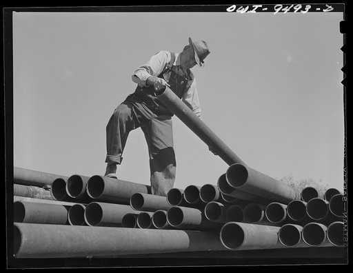 Tulsa, Oklahoma. Pipe in storage at the pumping station of the Great Lakes pipeline