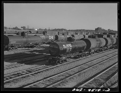 Untitled photo, possibly related to: Tulsa, Oklahoma. Oil tank cars in the Frisco railroad yards