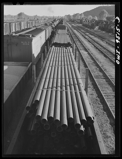 Untitled photo, possibly related to: Tulsa, Oklahoma. Pipe for the oil fields in the yards of the Frisco railroad