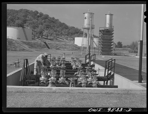 Untitled photo, possibly related to: Tulsa, Oklahoma. Operating a gate valve which controls the flow of refined products through the Tulsa station of the Great Lakes pipeline. This line sends gasoline from Oklahoma to Minneapolis