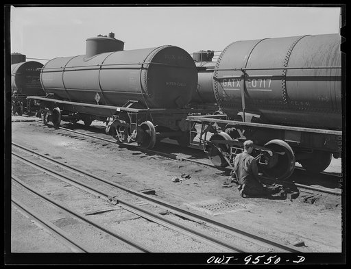 Tulsa, Oklahoma. Repairing wheels of an oil tank car
