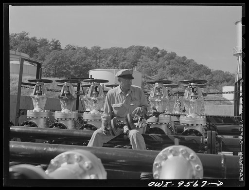 Tulsa, Oklahoma. Pumping station engineer with an apparatus known variously as "pig", "go-devil" and "scraper". It is sent through the eight inch pipeline at intervals for cleaning, to remove obstructions and to detect leaks