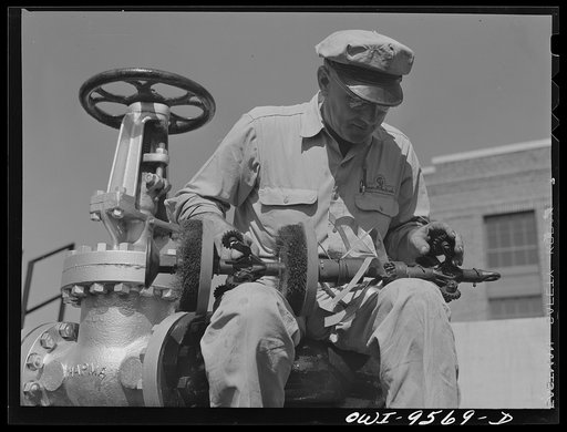 Tulsa, Oklahoma. Pumping station engineer with an apparatus known variously as "pig", "go-devil" and "scraper". It is sent through the eight inch pipeline at intervals for cleaning, to remove obstructions and to detect leaks