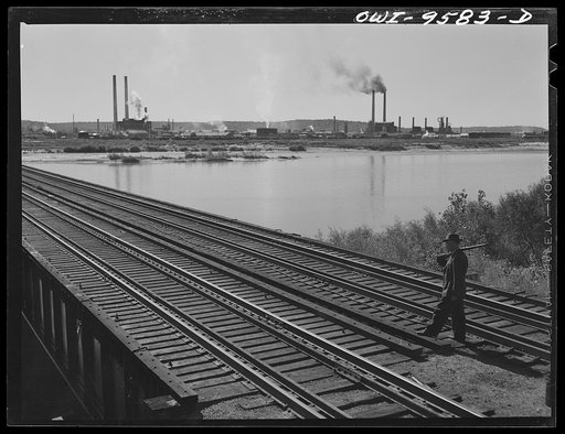 Tulsa, Oklahoma. Armed guard at the railroad bridge