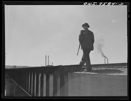 Tulsa, Oklahoma. Armed guard at the railroad bridge