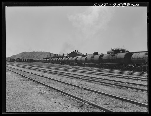 Untitled photo, possibly related to: Tulsa, Oklahoma. Oil tank cars in the railroad yards