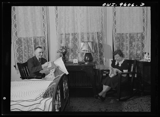 Butte, Montana. John Herlihy, shift boss at the Mountain Con Mine, at home with his wife