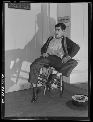 Butte, Montana. Doorkeeper at the Butte miners' union meeting