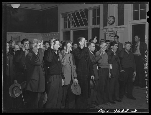 Untitled photo, possibly related to: Butte, Montana. New members being initiated at a meeting of the Butte miners' union