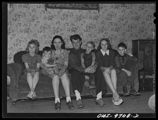 Untitled photo, possibly related to: Butte, Montana. Family of Victor Rauh, miner. Left to right: Gloria, Richard, Katherine, Mr. Rauh, Harvey, Dorothy, Victor Jr.