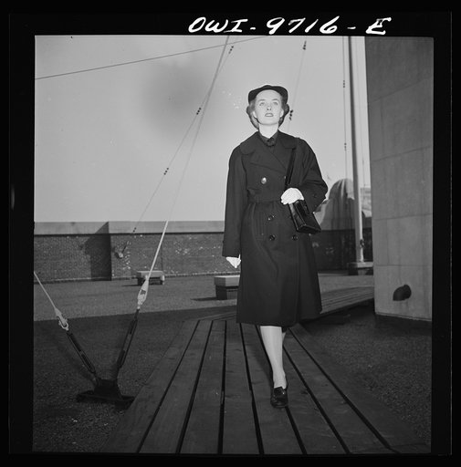 Untitled photo, possibly related to: New York, New York. Powers Agency model ina WAVE's (Women Auxiliary Volunteer Emergency Service) uniform overcoat