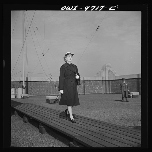 New York, New York. Powers Agency model in a WAVE's (Women Auxiliary Volunteer Emergency Service) uniform overcoat