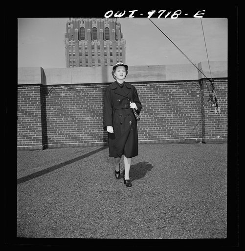 Untitled photo, possibly related to: New York, New York. Powers Agency model ina WAVE's (Women Auxiliary Volunteer Emergency Service) uniform overcoat