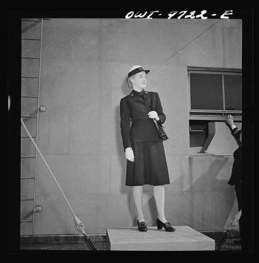 New York, New York. WAVE (Women Auxiliary Volunteer Emergency Service) uniform modeled by a girl from the Powers Agency