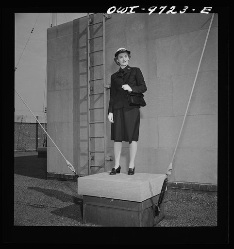 Untitled photo, possibly related to: New York, New York. WAVE (Women Auxiliary Volunteer Emergency Service) uniform modeled by a girl from the Powers Agency