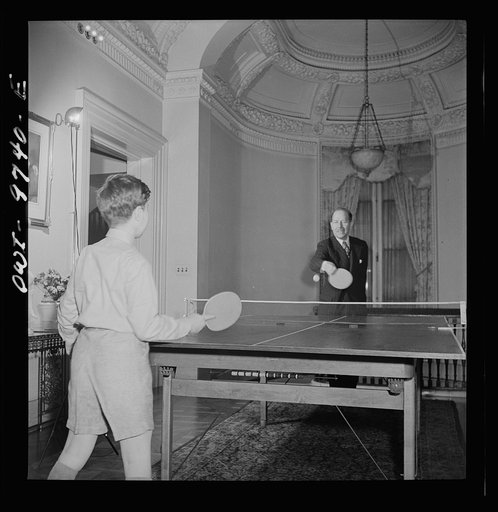 Washington, D.C. The Egyptian Legation on Massachusetts Avenue. Minister Hassan playing ping-pong with his son