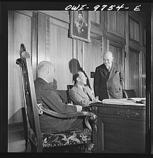 Washington, D.C. The Egyptian Legation on Massachusetts Avenue. Minister Hassan conferring with members of his staff