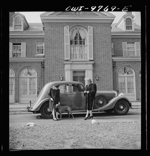 Untitled photo, possibly related to: Washington, D.C. The Australian Legation. Mrs. Casey, wife of the minister, about to enter her car in front of the legation
