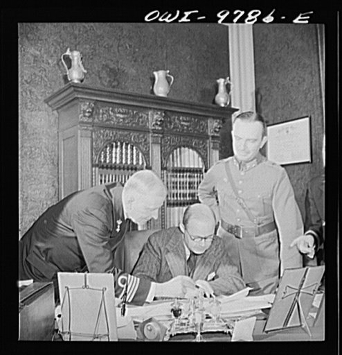 Washington, D.C. The Netherlands Legation. Minister Louden conferring with naval and military attaches