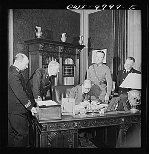 Washington, D.C. The Netherlands Legation. Minister Louden conferring with his military and naval staff