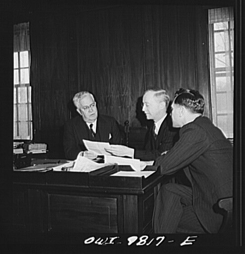 Washington, D.C. South African Legation on Massachusetts Avenue. Mr. R. W. Close, minister from the Union of South Africa, conferring with his first secretary