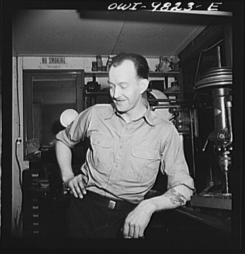 Passaic, New Jersey. Factory owner Carlson organized home machine shops for defense work. Home workshop owner of Sweedish origin who is now doing defense work