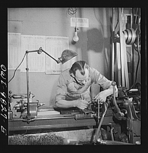 Passaic, New Jersey. Factory owner Carlson organized home machine shops for defense work. Home machine shop owner working for defense