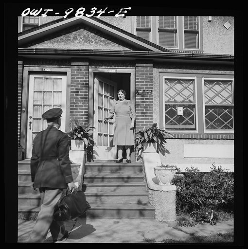 Untitled photo, possibly related to: Brooklyn, New York. A section of the city largely inhabited by Finnish-Americans near 39th Street and 8th Avenue known as Finn Town. Lieutenant Palmrose greeting his mother as he comes home on leave. Father Palmrose is a lawyer and also a building constructor. He