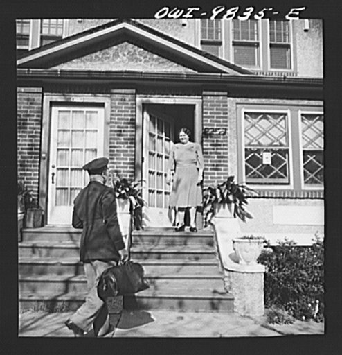 Brooklyn, New York. A section of the city largely inhabited by Finnish-Americans near 39th Street and 8th Avenue known as Finn Town. Lieutenant Palmrose greeting his mother as he comes home on leave. Father Palmrose is a lawyer and also a building constructor. He built his own home and others in the