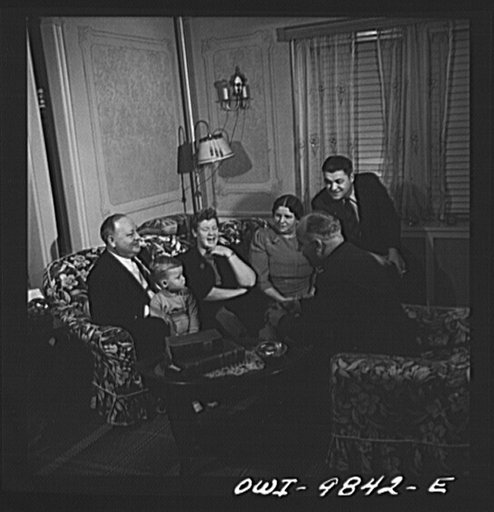 Brooklyn, New York. A section of the city largely inhabited by Finnish-Americans, near Thirty-ninth Street and Eighth Avenue, known as Finn Town. Palmrose family in their home. From left to right: father, daughter's two-year old son, mother, son-in-law, and son on leave from the United States Army